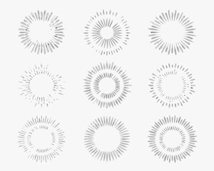 Collection of nine hand drawn sunburst rays and starburst elements