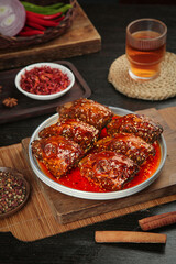 Spicy Rabbit Head Dish from Chengdu Shuangliu with Tea and Spices - Traditional Sichuan Cuisine