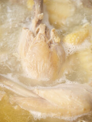 Fresh Chicken Cooking in Hot Broth for Homemade Soup Preparation
