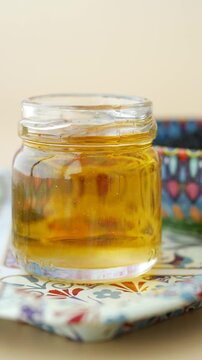 black cumin seeds oil in a container 