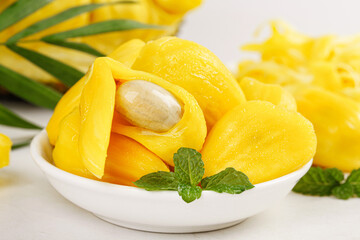 Fresh Vietnamese Pineapple Slices with Honey and Mint in White Bowl - Tropical Fruit Presentation