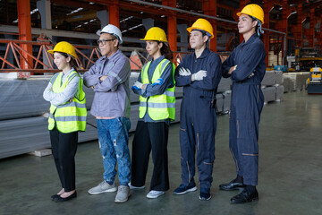 Group of engineers boost customer confidence. Teamwork concept. Group of young businessmen working as a team and shaking hands.