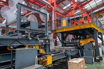 Metal Sheet Rolling Machine in Industrial Factory