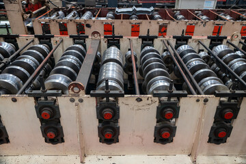 Obraz premium Metal Sheet Rolling Machine in Industrial Factory