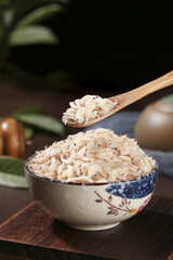 Dried Sea Shrimp in Traditional Bowl with Wooden Spoon - Asian Seafood Ingredient