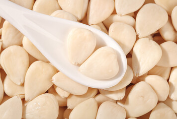 Peeled Sweet Almonds in Wooden Spoon - Healthy Nuts for Cooking and Baking