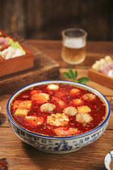 Hot Spicy Meatball Soup with Shabu Shabu Ingredients for Asian Hot Pot Dining