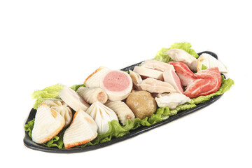 Hotpot Ingredients Platter with Fish Balls Beef Potato and Variety of Asian Delicacies on White Background