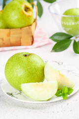 Fresh Dangshan Pears from Anhui China Sliced Still Life with Mint Leaves