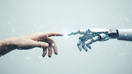A human hand and a robot hand almost touch, symbolizing the intersection of technology and humanity with digital connections.