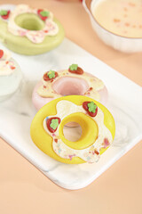 Cute Cartoon Donuts with Vegetable Toppings for Kids Breakfast Special Package Design