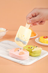 Colorful Cartoon Character Popsicles and Animal-Shaped Frozen Treats for Children