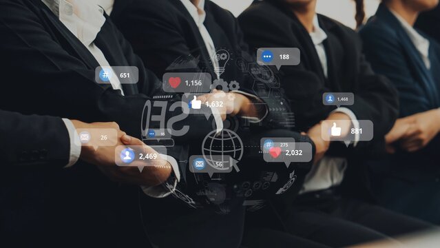 Business Team Collaborating in a Meeting with Digital Social Media Icons and Engagement Metrics Representing Online Presence and Interaction. Raster.