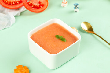 Tomato Paste in White Bowl with Fresh Tomatoes and Mint