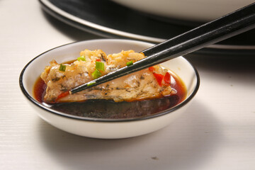 Steamed Fish Head with Chopped Peppers and Garlic in Soy Sauce Asian Cuisine