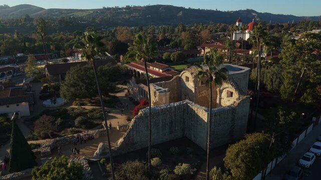 descending aerial shot of historic Mission of San Capistrano
