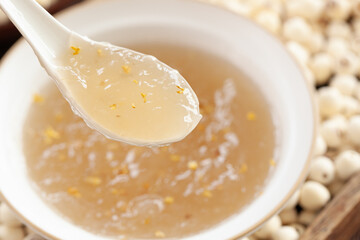 Bird's Nest Soup with Lotus Root Cinnamon Powder Traditional Chinese Wellness Cuisine in White Bowl