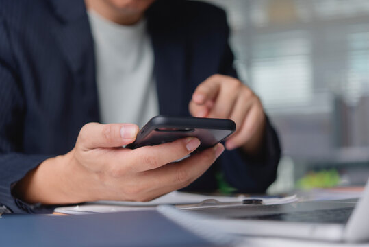 Person fingers touching cellphone screen analyzing financial stock graph. Entrepreneur monitoring business growth data online app. Modern connectivity network success strategy.