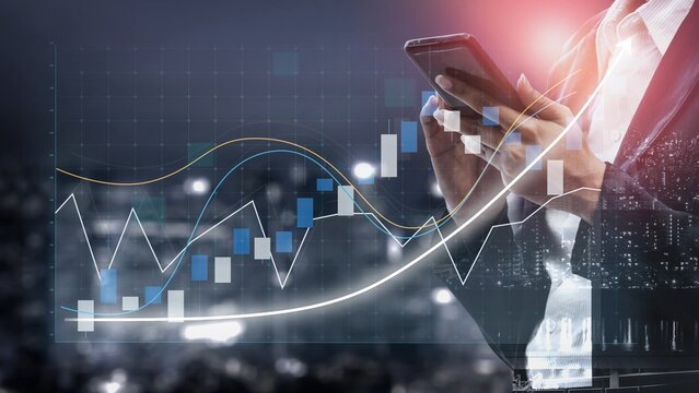 A business professional examines financial data on a smartphone, depicting modern analytics and stock market trends in a vibrant urban setting at night. Copula