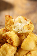 Crispy Golden Roasted Potato Chunks with Fluffy Interior - Popular Comfort Food Snack