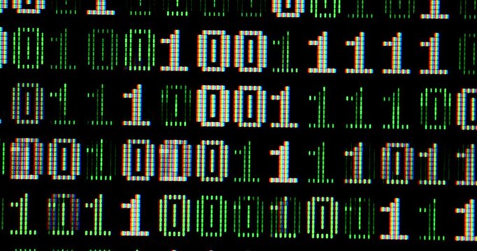 binary code in monitor close-up concept hacking security IT technology