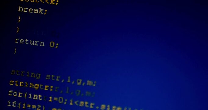 Software developer programming code on Computer language script