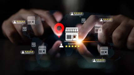 Digital representation of business ratings where hands interact with a global map. Features store icons and customer feedback symbols to illustrate online engagement. Gantry