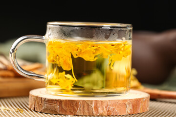 Dendrobium Flower Herbal Tea in Glass Mug