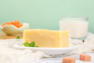 Large German Cheese Block with Holes and Dairy Ingredients