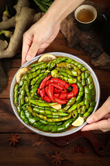 Traditional Chinese Pickled Green Peppers and Red Chili Appetizer
