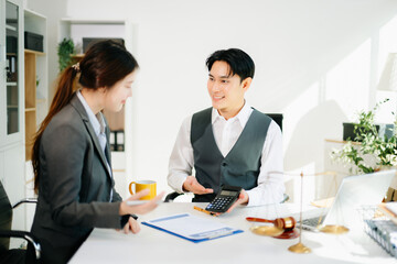 Business client signing a legal contract during a professional consultation. Perfect for themes of law, agreement, consulting, and corporate partnership.