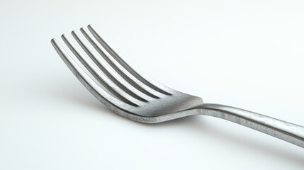 Close-Up of Minimalist Stainless Steel Fork on Plain White Background