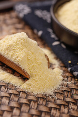 Freshly Ground Glutinous Rice Flour on Wooden Spoon for Asian Cooking and Baking Ingredients