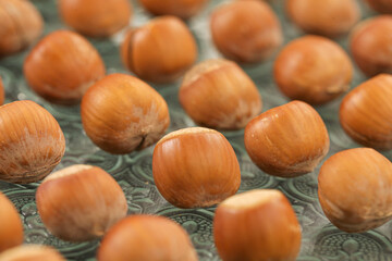 Fresh Handpeeled Hazelnuts Without Shell on Wooden Background - Natural Northeastern Nuts for Cooking and Baking
