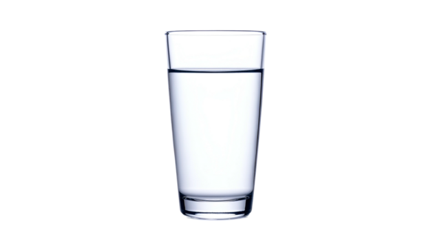 A tall, clear glass nearly full of water against a stark, black background
