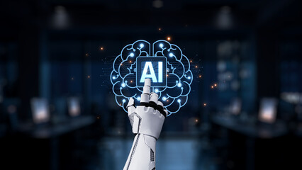 A futuristic robotic hand interacts with an artificial intelligence icon surrounded by a digital brain graphic, symbolizing technology and innovation in a modern office. Synapse