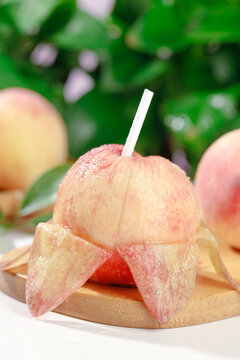 Fresh Yangshan Peaches Freshly Picked and Peeled on Wooden Board