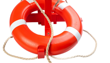 Bright orange life preserver ring with white stripes, mounted on a red stand and rope