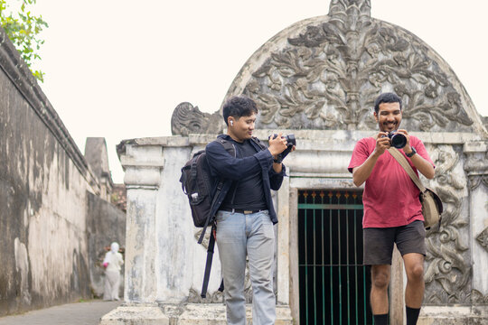 Photographers capturing moments at Taman Sari Water Castle in Yogyakarta