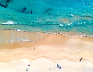 Aerial shot of a vibrant beach with turquoise waters meeting the sandy shoreline. One person is present