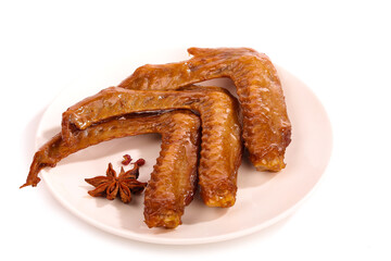 Spicy Duck Wings with Star Anise on White Plate - Five Glazed Poultry Wings