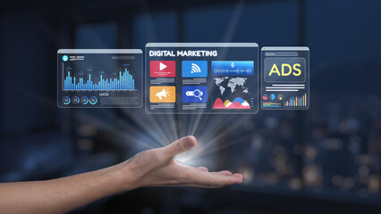 A hand extends towards vibrant digital marketing icons and data visuals, symbolizing innovation and growth in advertising strategies for a modern business landscape. Synapse