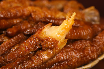 Marinated Chicken Feet with Golden Crispy Skin in Savory Sauce - Traditional Asian Dim Sum Snacks