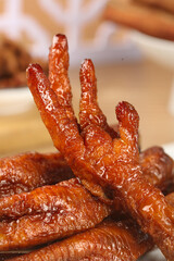 Glazed Chicken Feet Asian Delicacy with Secret Marinade Sauce - Traditional Crispy Snack Food
