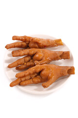 Spicy Marinated Chicken Feet on White Plate - Traditional Asian Dim Sum Delicacy