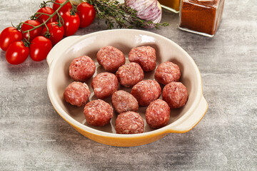 Uncooked raw beef meatball minced