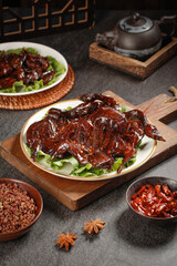 Marinated Smoked Quail Ready to Eat Traditional Chinese Delicacy with Tea Setting