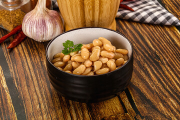 Baked white canned beans in the bowl