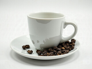 Blank White Ceramic Teacup and Saucer with Scattered Tea Leaves