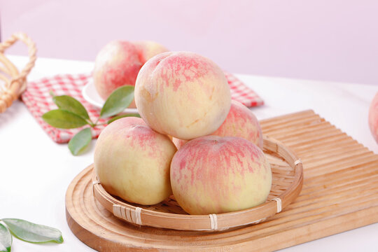 Fresh Yangshan Peaches from Wuxi China Ready to Pick in Bamboo Basket